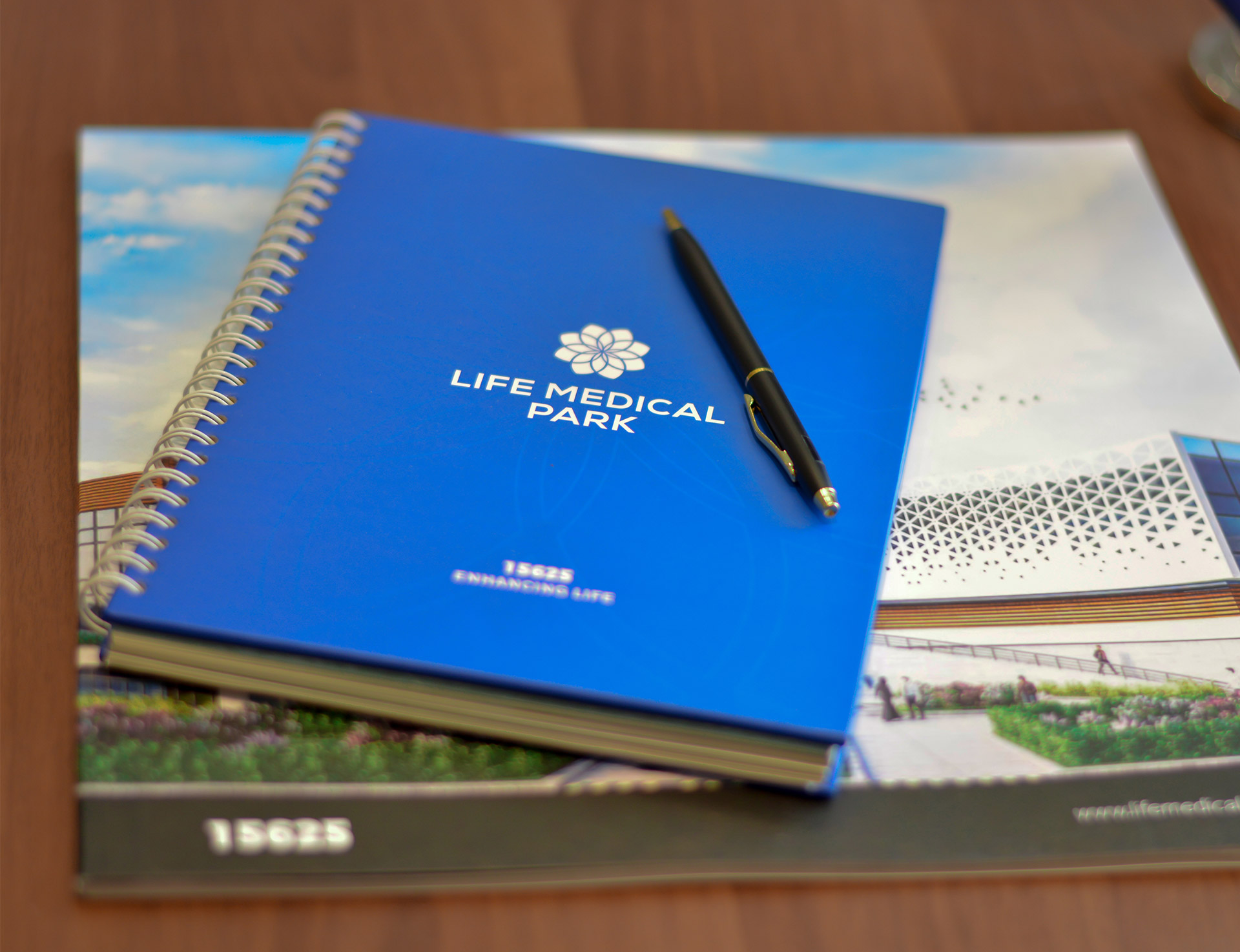 life medical park hospital block note pen notebook calendar design production event branding material